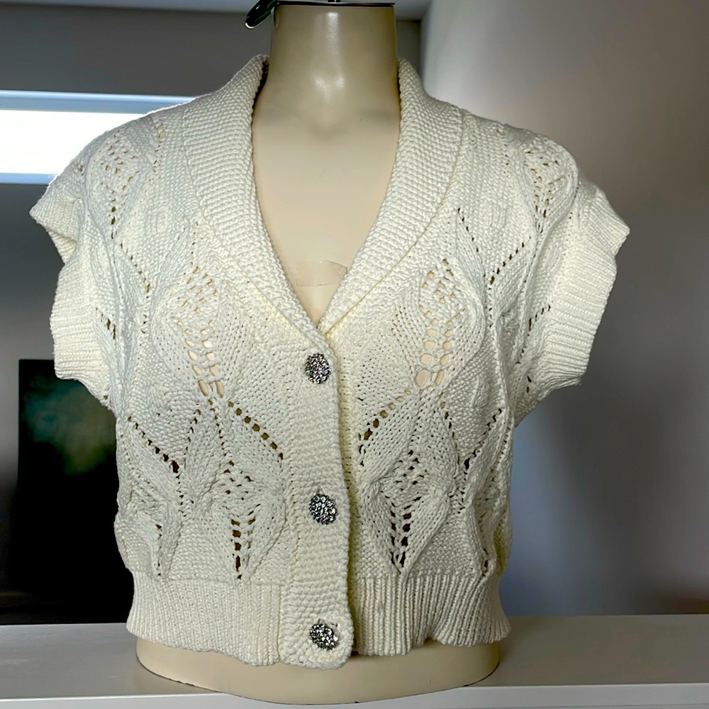 Beautiful Cream sweater with shiny diamond cluster buttons.